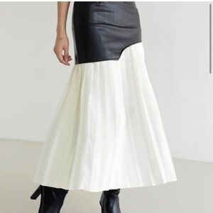 Pleated, faux leather skirt